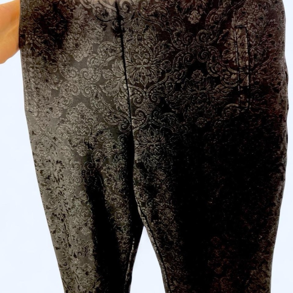 Chico's black trousers w floral pattern. 12T